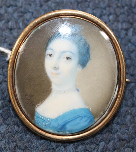 John Smart (1742-1811) Miniature of a lady wearing a blue dress, 3.1 x 2.9cm.
